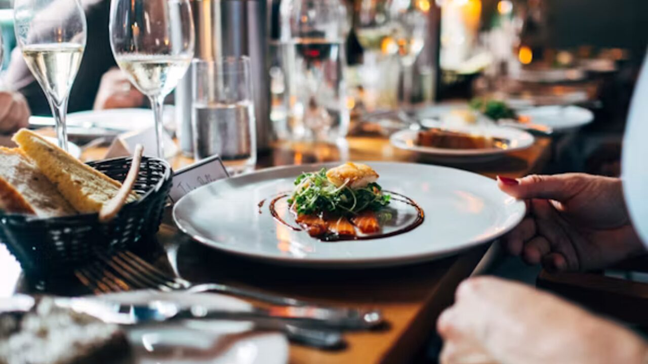 A plated dish in a warm dining room