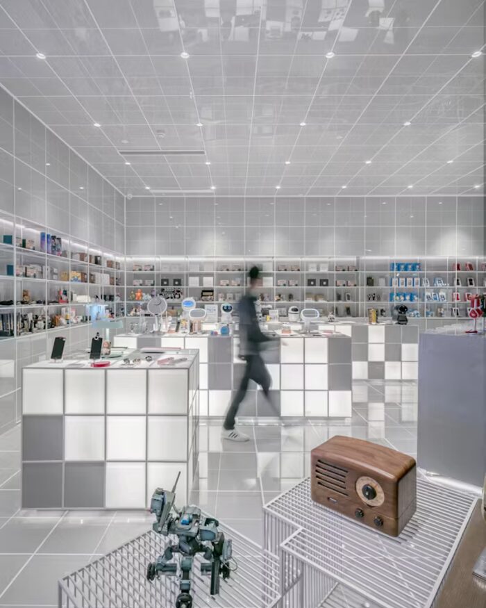 Sunlit corner of the Mercer and Vale store with white tiling and neatly arranged homeware