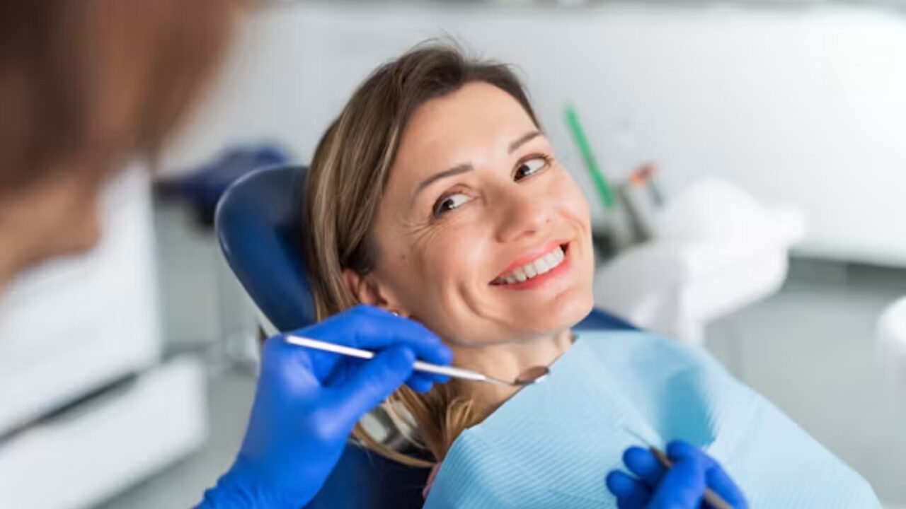 A happy patient in a bright, calm practice